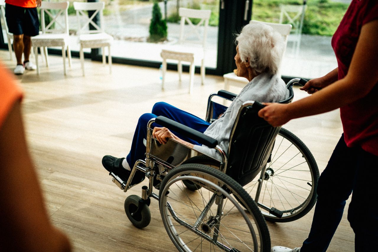 The Art of Drawing Readers In: Your attractive post title goes here A caregiver assists a senior adult in a wheelchair at a nursing home in Prague, Czech Republic.